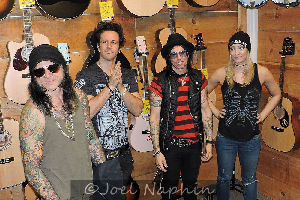 Alice Cooper's band made a stop at Mike's Music in Thorold, ON for a meet and greet with fans. From left to right: Chuck Garric (bass), Glen Sobel (drums), Tommy Henriksen (guitars) and Nita Strauss (guitars) PHOTO CREDIT: Joel Naphin