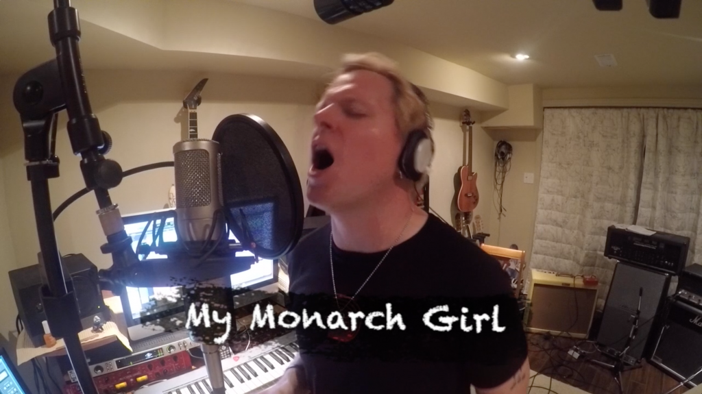 A screen capture of the lyric video for the title track from Dave Dunlop's debut solo album, Monarch Girl. 